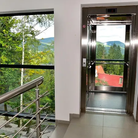 Szarotka - Apartamentuj Apartmán